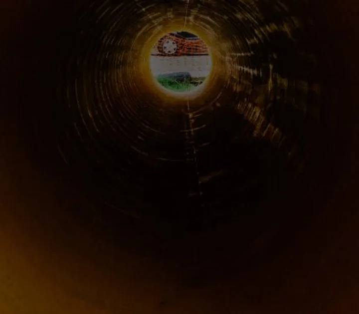 View through a drainage pipe, from the original Scott & Sons website
